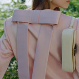 MERINGUE BOW JACKET IN PINK CAMELLIA